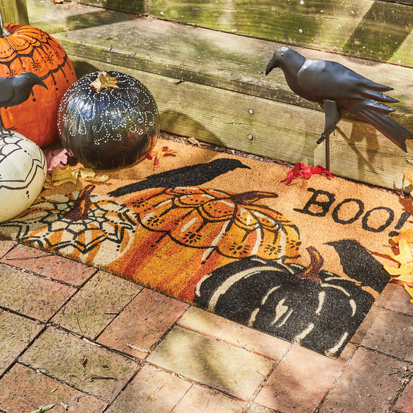 Our Two Crows and Pumpkins Doormat (set of 2) will liven up your entryway and add a Halloween welcome to your home.  Featuring two crows perched on decorated pumpkins with the word BOO!