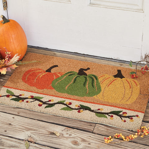 Our Bittersweet Doormat will liven up your entryway and add a fall welcome to your home.  Featuring three multicolored pumpkins and a sprig of bittersweet.