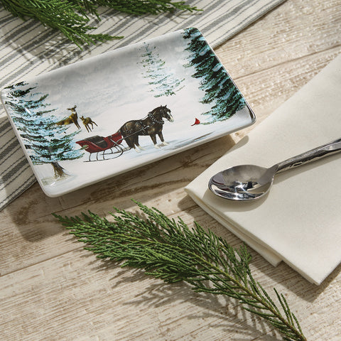 Add a calming and gorgeous touch to your holiday kitchen while keeping your stove and countertop clean with the All Is Calm Spoon Rest, featuring a serene winter forest! Complete the look with the coordinating mugs, salt & pepper shakers, oval platter, cookie jar, soap pump, and salad plates!
