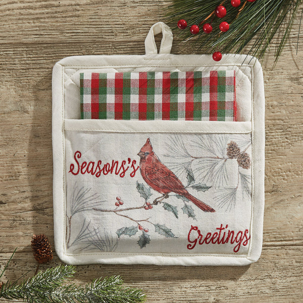 Add a whimsical and stylish accent to your holiday kitchen with the Wild And Beautiful Holiday Pocket Potholder Set! Featuring a branch of pine and Cardinal with the message Season's Greetings. The potholder is accompanied by a red, green, and white plaid dishtowel, this set is sure to be a stylish and charming accent to your decor!