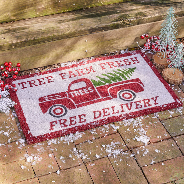Our old time Tree Farm Doormat will liven up your entryway and add festive welcome to your home.  Features a classic old red truck delivering a Christmas tree!
