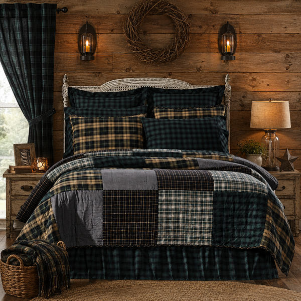 Pine Grove Queen Quilt 90x90 featuring pine green, black, tan, and grey plaid patchwork in a rustic lodge bedroom setting.