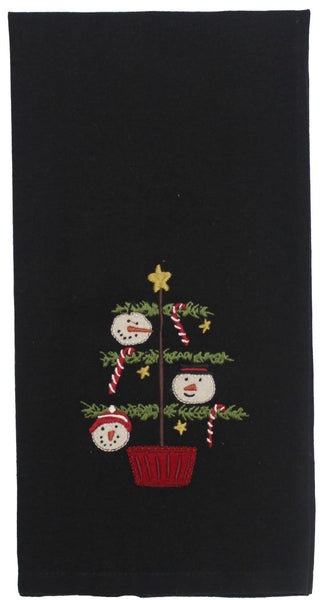 Black cotton towel embroidered with a Christmas tree, snowman faces, candy canes, and gold stars in red, tan, and green. Set of 2.