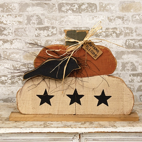 Autumn Blessings layered wood pumpkin stack with black crow, three black stars, rustic raffia, and natural wood base