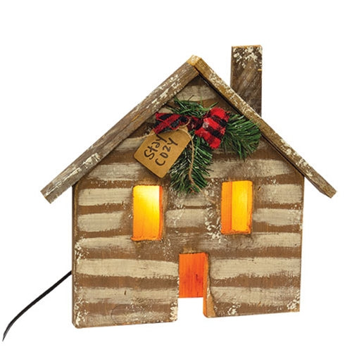 Rustic Wood Stay Cozy Light Up Cabin with illuminated windows and distressed wood finish displayed as cozy primitive farmhouse décor on a shelf, mantel, or tabletop.