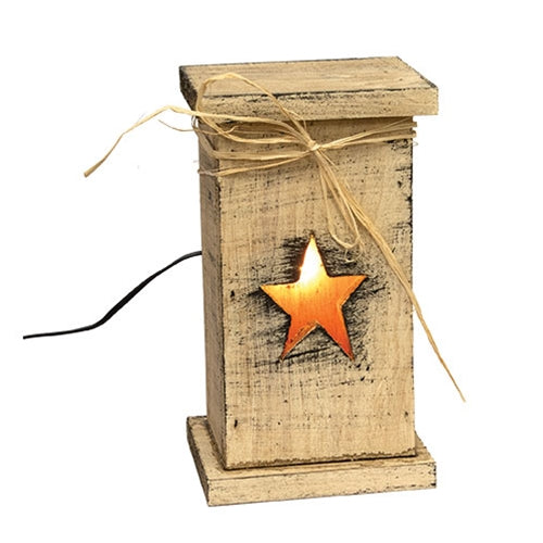 Rustic wood lighted pedestal with distressed finish, straw bow and glowing star cutout