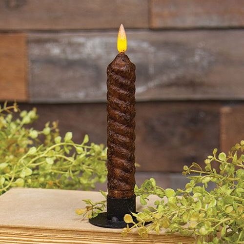 Bring rustic charm to your home with the Burnt Mustard Vintage Twist Flicker Flame Timer Taper, 6.25". Featuring a textured spiral design, cozy flicker, and 6-hour timer, it’s the perfect flameless primitive accent.