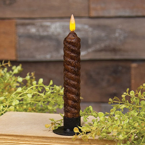 Bring rustic charm to your home with the Burnt Mustard Vintage Twist Flicker Flame Timer Taper, 6.25". Featuring a textured spiral design, cozy flicker, and 6-hour timer, it’s the perfect flameless primitive accent.