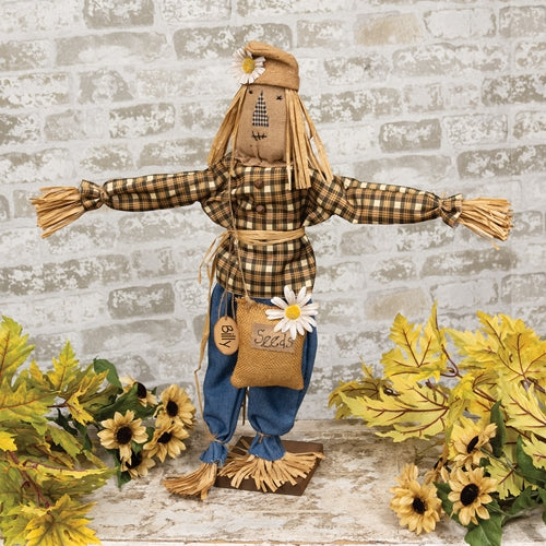 Primitive Billy Gardener standing scarecrow on a wood base with plaid shirt, burlap hat, and dried wheat for fall decorating.