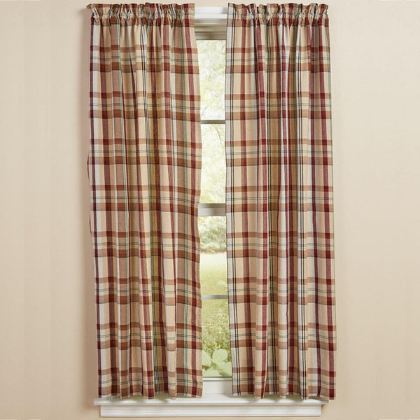 The Gamekeeper Plaid Panels add a charming touch to your window! Featuring a classic plaid design in tones of antique white, tan, red, green, and black, these panels will be a stylish accent to your decor!