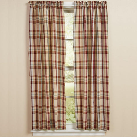 The Gamekeeper Plaid Panels add a charming touch to your window! Featuring a classic plaid design in tones of antique white, tan, red, green, and black, these panels will be a stylish accent to your decor!