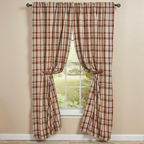 The Gamekeeper Plaid Lined Panels add a charming touch to your window! Featuring a classic plaid design in tones of antique white, tan, red, green, and black, these panels will be a stylish accent to your decor!