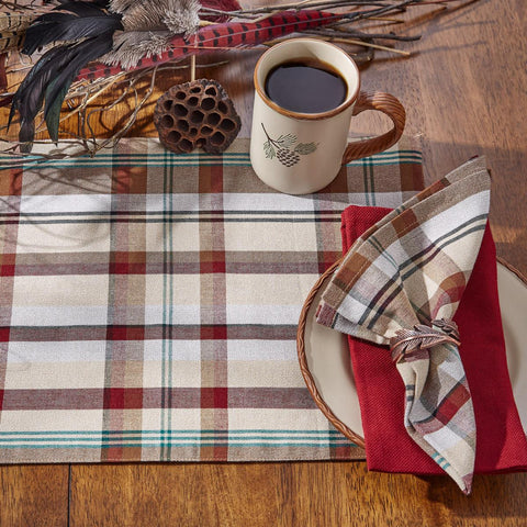 The Gamekeeper Plaid Placemats add a charming touch to your country table! Featuring a classic plaid design in tones of antique white, tan, red, green, and black, these placemats will be a stylish accent to your decor! Complet your kitchen decor with the matching Gamekeeper Plaid Napkins and Table Runners!