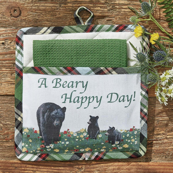 Wish everyone "A Beary Happy Day" everyday with the Happy Trails Pocket Potholder Set! The classic plaid pattern is a timeless way to add style to your decor, while the adorable mama and baby bear patch is sure to bring a smile to your face! The set also includes a solid green dishtowel. Coordinate with the complementary Happy Trails kitchen linens and curtains for a complete look! 