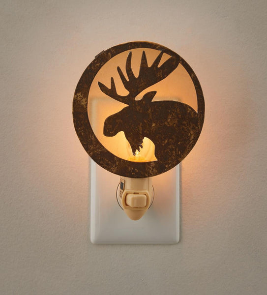 Catch a glimpse of a bold moose in the wilderness while illuminating your space with this beautiful Moose Head Night Light!