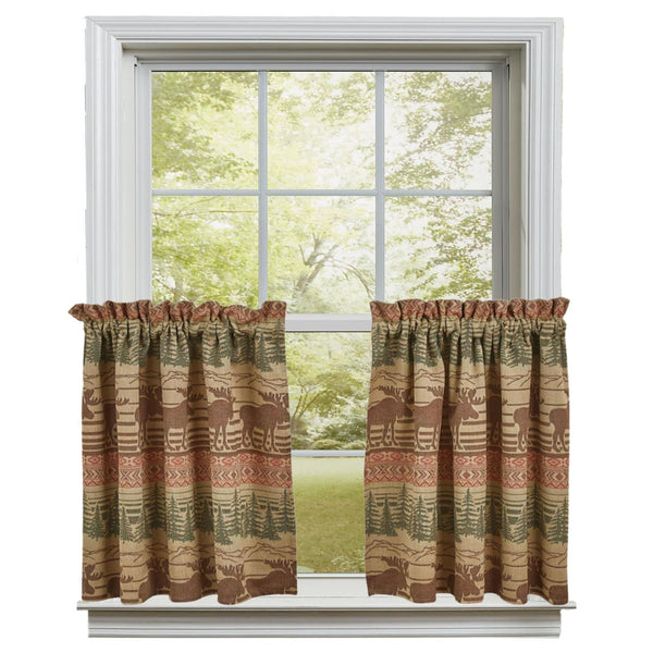 The Moose Jacquard Tiers offer a beautiful outdoorsy appeal! Featuring a blend of neutral colors and a pop of red that work together to create a breathtaking scene of moose in their natural habitat, the design is sure to bring the rugged outdoors in! Coordinate with the complementary Moose Jacquard kitchen linens, window swags, and window valance to complete the look!