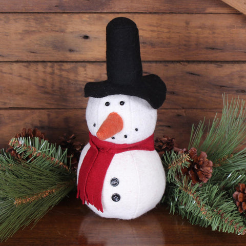 Add cozy farmhouse charm with the Winter Wishes Snowman. Wool felt holiday décor, perfect for mantels, shelves, or centerpieces. Ships in 7–10 days!