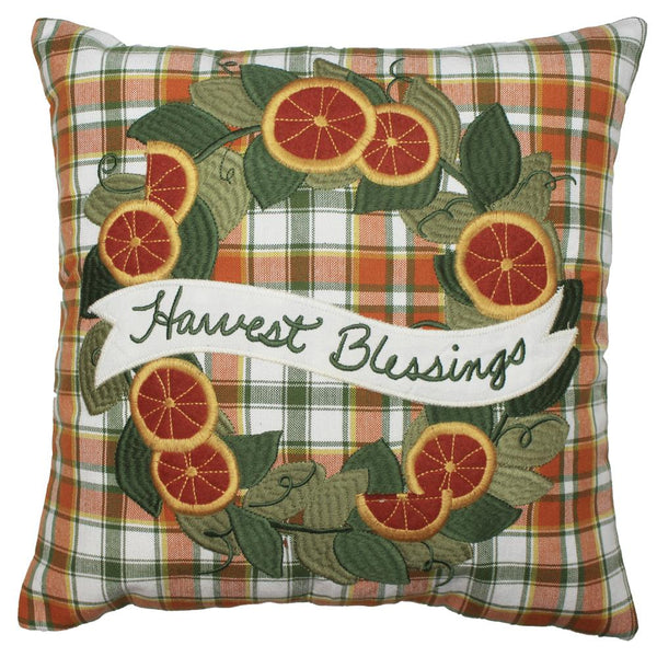 Fall Harvest Wreath Pillow with embroidered wreath and Harvest Blessings text in autumn tones.