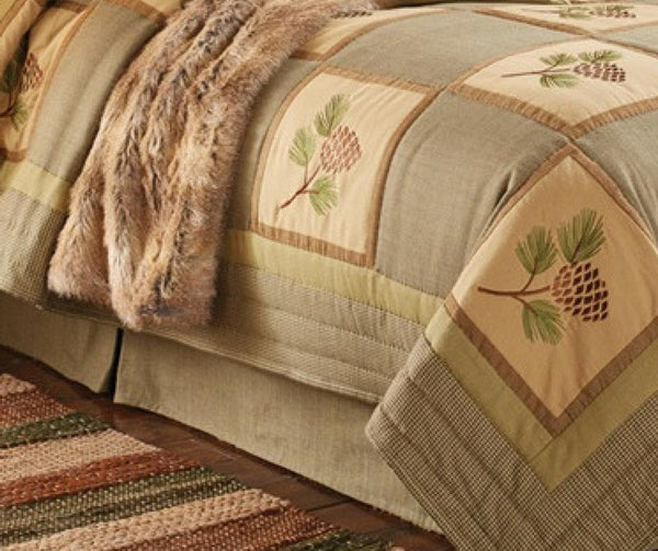 Add a splash of country flair to your quiet place with this Pineview Queen Bed Skirt! The pine cone & bough motif take center stage amidst a quilted background, oozing outdoorsy appeal! Rest easy with this country-lovely sham! Complete the look with the Pineview Standard Sham and Pineview Queen Quilt!