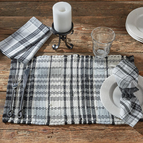Add charming style to your table with the Refined Rustic Chindi Placemats! Featuring a classic plaid design in tones of antique white, gray, and black, these placemats will be an elegant touch to your country decor! Complete the look with the rest of the Refined Rustic collection!