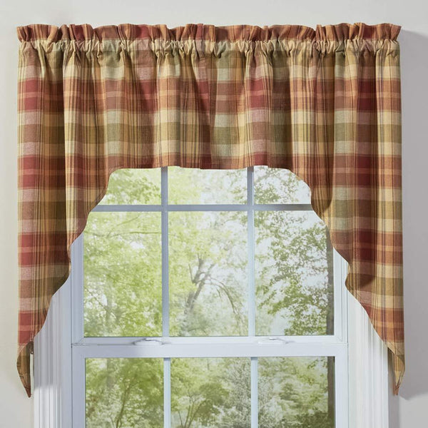 Bring farmhouse charm to your home with the Saffron Plaid Swag. Measuring 72x36, its warm red, sage, blue & butter tones add cozy country style to any window.