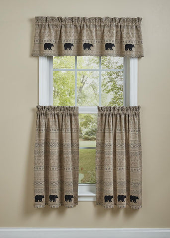 Give your window a modern rustic touch with the Signal Mountain Valance! The tribal design, neutral colors, and bear accents provide a unique and stylish accent! Add the complementary kitchen linens and curtains for a complete look!