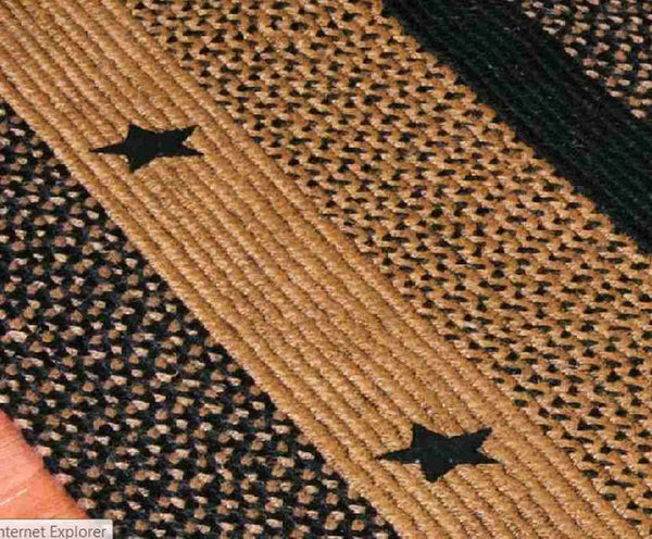 Star Black Braided Jute Rug Close-up