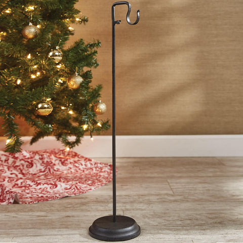 And the stockings were hung by the chimney with care! This simple rustic Iron Vertical Adjustable Stocking Hanger will be happy to hold your favorite Christmas stocking! So versatile... Use on a mantel, table, or anywhere in your home that needs a touch of style! Adjustable to fit any need!