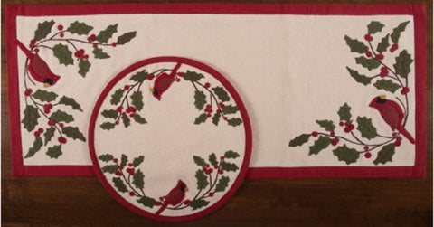 Cream felt Christmas table runner with red cardinal birds, holly leaves, berries, and a coordinating red border.