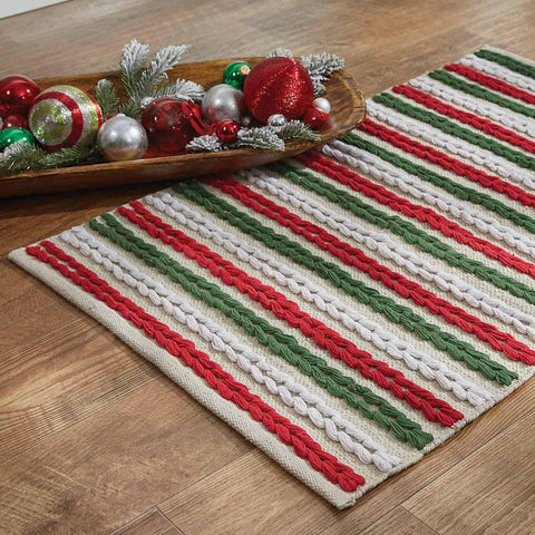 Bring the celebration of the Christmas season to your floors with the Winter Magic Scarf Multi Rug by Park Designs! A gorgeous festive red, green, and candlelight white stripe is sure to bring a warm feeling to your holiday decor!