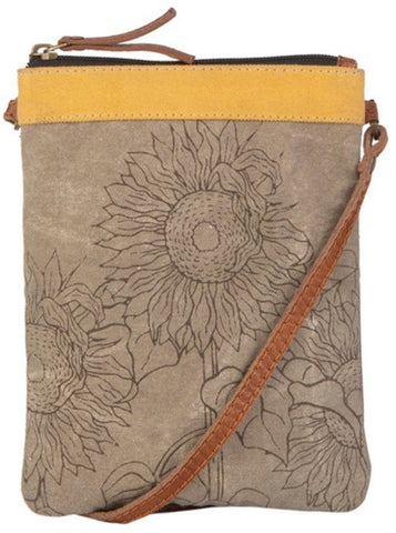 A minimalist bag with maximum impact, the Sunny (sunflower) crossbody is effortlessly versatile and perfect for traveling light. Measures. Made from durable re-milled and up-cycled military tarps & tents used by the army, covering trucks as tarps and providing shelter as tents, this textile is given new life.