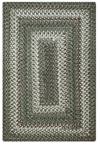 Waterproof indoor/outdoor braided rug in Cedar Ridge pattern, green, tan, and brown tones, washable and reversible.