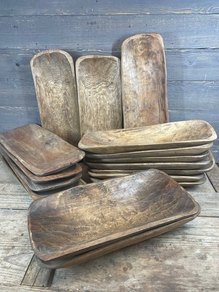 Rustic Santa Fe wooden dough bowls, hand-carved with waxed finish, shown in varying sizes and tones, made in Mexico.