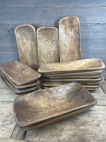 Rustic Santa Fe wooden dough bowls, hand-carved with waxed finish, shown in varying sizes and tones, made in Mexico.