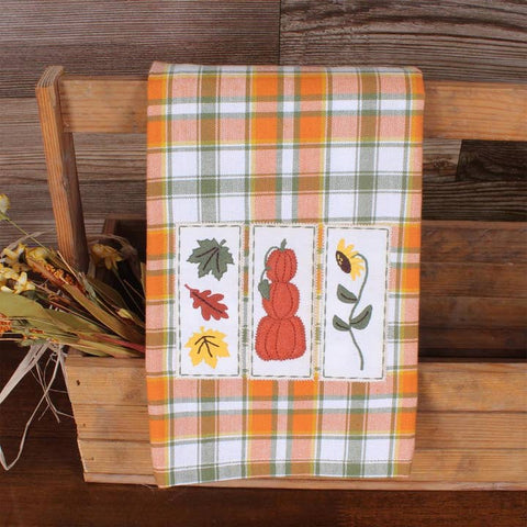 Fall Harvest Sampler embroidered cotton towels with pumpkin, sunflower, and leaf designs.