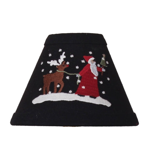 Christmas Friends Lampshade featuring Santa and a reindeer in a snowy winter scene on black fabric displayed on a candle lamp.