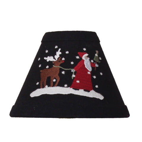 Christmas Friends Lampshade featuring Santa and a reindeer in a snowy winter scene on black fabric displayed on a candle lamp.