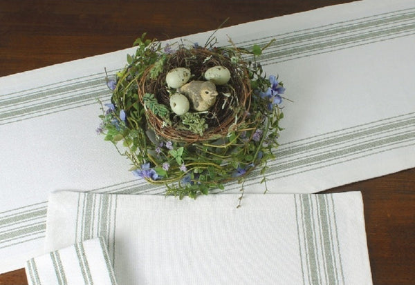 Grain Sack Sage Table Runner 14x45 Bring farmhouse chic styling to your table with the Grain Sack Stripe Sage Table Runner. Pair with coordinating placemat, napkin, and window treatments to complete the look. Measures 14"x45". Made of 100% cotton. Machine wash cold, gentle cycle. Line dry. Do not bleach.