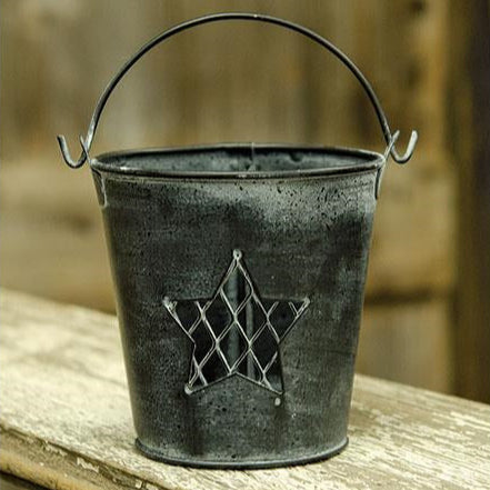 Add rustic charm with the Star Bucket, a distressed metal pail featuring a punched star cutout and chicken wire backing. Perfect for florals, candles, or storage in your farmhouse or primitive décor.