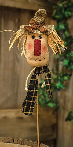 Primitive 15-inch scarecrow floral pick with burlap hat, raffia hair, and gingham bow for fall decorating.