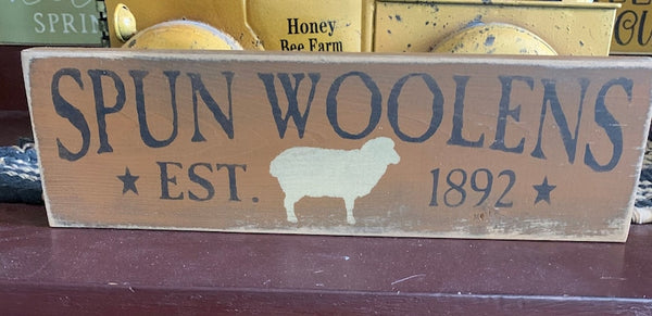 Primitive Country Spun Woolens 12" sign