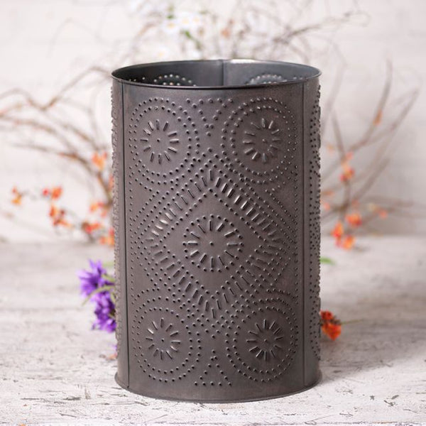 Our primitive Waste Basket in the Diamond pattern is a wonderful piece to add to your room for a country look. Created from punched tin panels and joined with seams for a clean look, it has many more uses than just a waste basket... dried arrangements, our natural birch stems, or sports equipment.