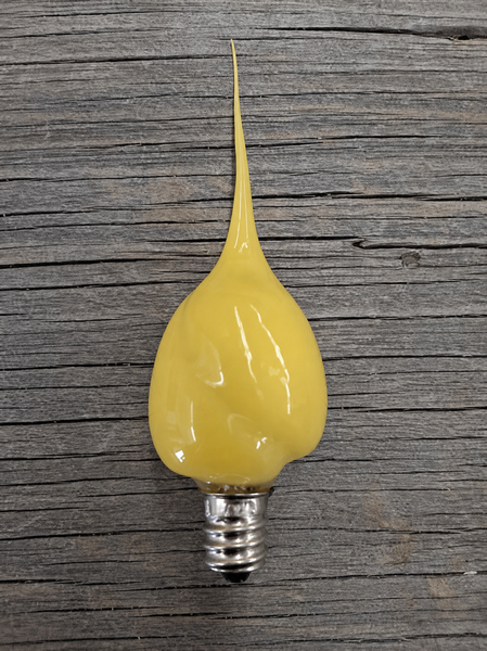 Yellow 4-watt silicone-dipped decorative bulb with candelabra base for primitive country lighting