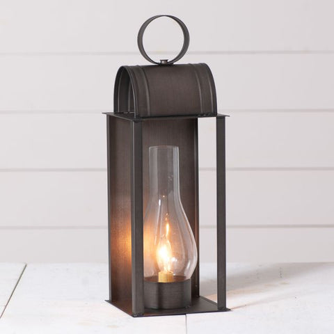 A lantern reminiscent of those used in early America that has been electrified. 10-inch glass chimney included.