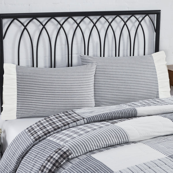 Relax in style with the 21x26+4 Sawyer Mill Black Ruffled Standard Pillow Case Set of 2 while finishing your farmhouse home decor. Rich alternating colors of black and soft white add a farmhouse element and neutral backdrop to offset your decor. The flat weave and straight edge bring out the country aesthetic of any li…