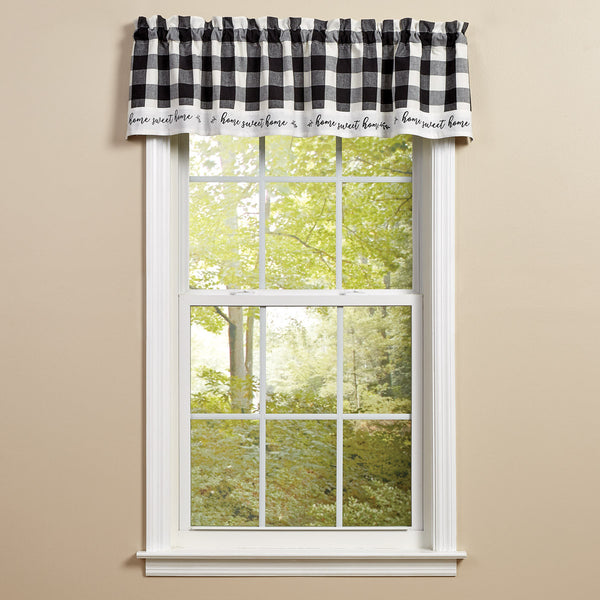 Your sense of style will show through with the Wicklow Home Black & Cream Valance! The charming black and white large check pattern is sure to catch the eye of everyone, and the "Home Sweet Home" edging is the perfect finishing touch!  Colors: Black & cream/white