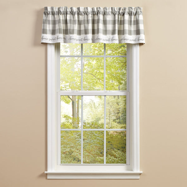 Your sense of style will show through with the Wicklow Home Dove Valance! The charming gray and white large check pattern is sure to catch the eye of everyone, and the "Home Sweet Home" edging is the perfect finishing touch!  Colors: Dove Gray & White