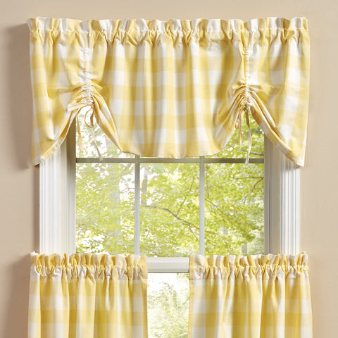 The Wicklow Check Yellow Farmhouse Valance by features a lemon yellow and cream/white classic farmhouse check that is sure to complement any home design! Beautiful on its own, or pair with coordinating tiers (as pictured / sold separately) for a complete look.  Colors: Lemon Yellow & cream/white
