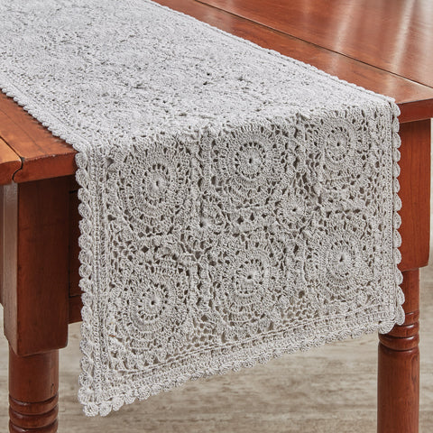 Simply beautiful! The Mist Lace Table Runners are perfect on their own, and being a neutral color, they will fit in with any decor! The runners are available in two different sizes.  Color: Whisper Greige
