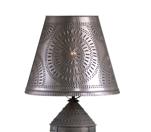 A traditional shade that gives you a beautifully patterned light effect on the walls of your home. With a large amount of punching in the each shade, the glow cast from this shade adds a new dimension to your decorating. Each shade has a washer fitter to be used with a harp on your existing lamp base.